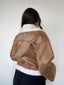 Chaqueta caqui tipo cazadora para mujer con chiporro, cinturón y cuello alto kadenkas.com