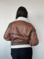Chaqueta toffee café tipo cazadora para mujer con chiporro, cinturón y cuello alto kadenkas.com