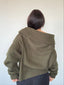 Sweater musgo tejido para mujer con diseño off-shoulder, suave y elegante kadenkas.com