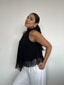 Top polera negro halter asimétrico con detalle de encaje negro y amarras, diseño elegante para mujer
