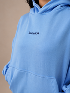 POLERÓN HOODIE CANGURO LOGO BORDADO - CELESTE