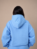 POLERÓN HOODIE CANGURO LOGO BORDADO - CELESTE
