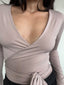 TOP PILATES BEIGE - POLERA MANGA LARGA ESCOTE CRUZADO AMARRAS