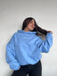 POLERÓN HOODIE CELESTE - OVERSIZE CON GORRO LOGO Y ESPALDA BORDADO