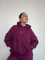 POLERÓN OVERSIZE CON GORRO - BURDEO